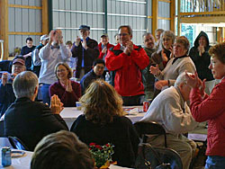 Crowd applaudes at Flanders Pavilion dedication
